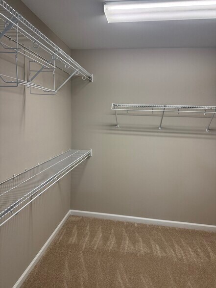 Master bedroom has huge walk in closet - 8321 Deckbar Pl