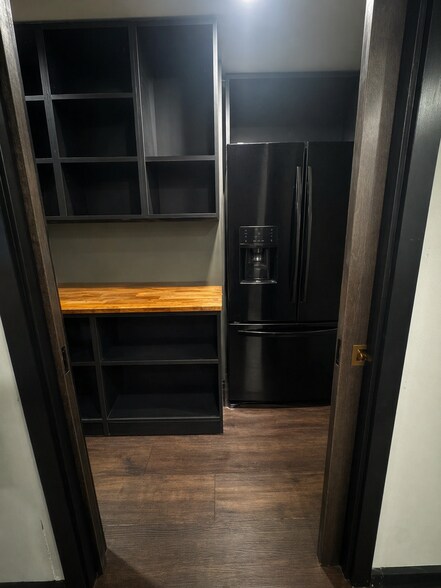 Walk-in pantry off kitchen with second fridge - 6810 Topaz Dr SW