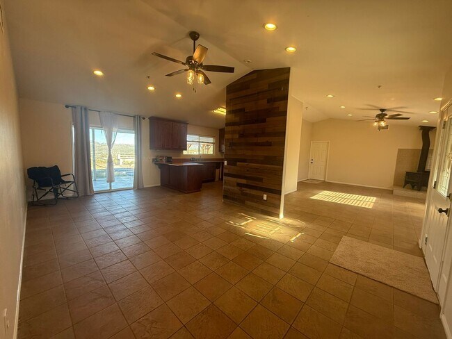 Building Photo - 4BR/2BA HOME w/ attached garage, usable land, fenced in back yard in CAMPO available!