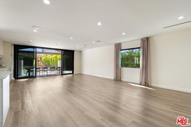 Building Photo - 11700 Woodley Ave