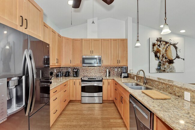 Building Photo - BEAUTIFUL 2 BEDROOM 2 BATHROOM + A DEN VILLA WITH GORGEOUS LAKE VIEWS!