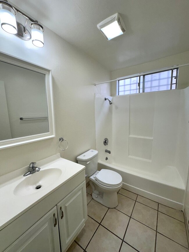 Building Photo - Lower Level Rose Park 3 Bedroom Apt With P...