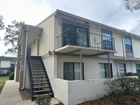 Building Photo - **MOVE IN SPECIAL $500 Off the first months rent** COZY 2 Bedroom/1.5 Bathroom 2nd Floor Condo!!
