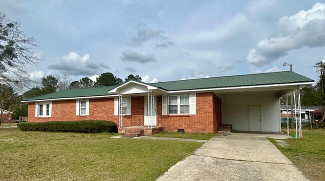 Primary Photo - 4 Bedroom and 2 bathroom Brick Home