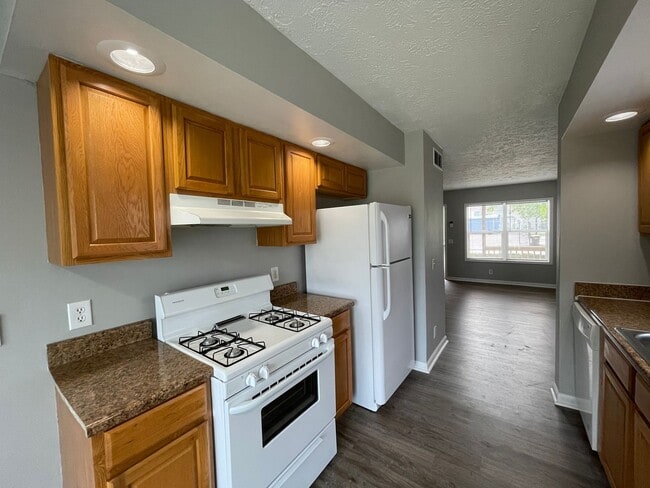 Building Photo - For Rent - Four-Bedroom Two-Bathroom Home ...