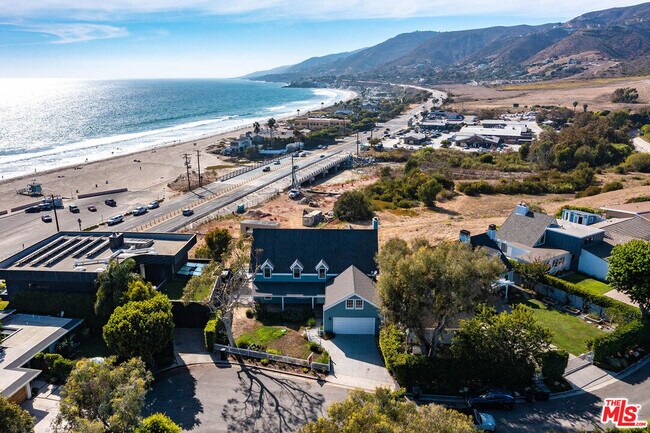 Building Photo - 6457 Surfside Way