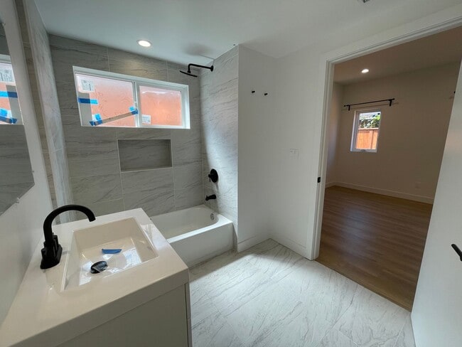 Building Photo - JUST COMPLETED MODERN TOWNHOMES! Never Lived In!