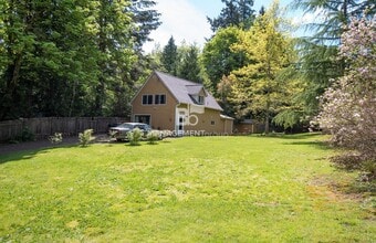 Building Photo - Nearly 1/2 Acre of Privacy Nestled in the Trees of West Linn. Updated Kitchen & Bathroom!