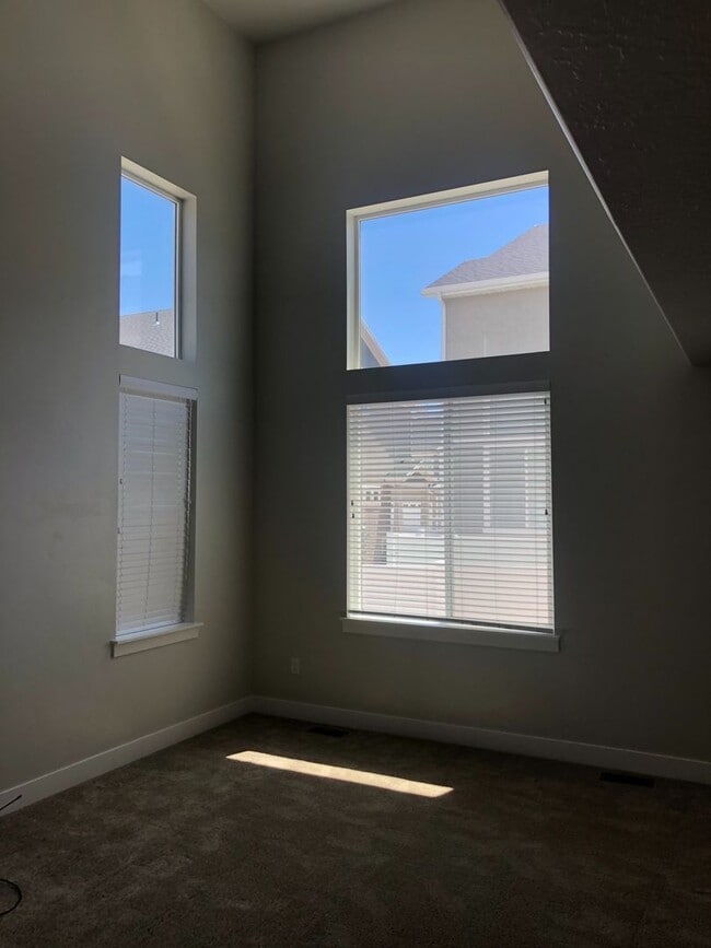 Building Photo - AMAZING HOME IN SOUGHT AFTER EXCHANGE DEVELOPMENT W/ 2 CAR GARAGE