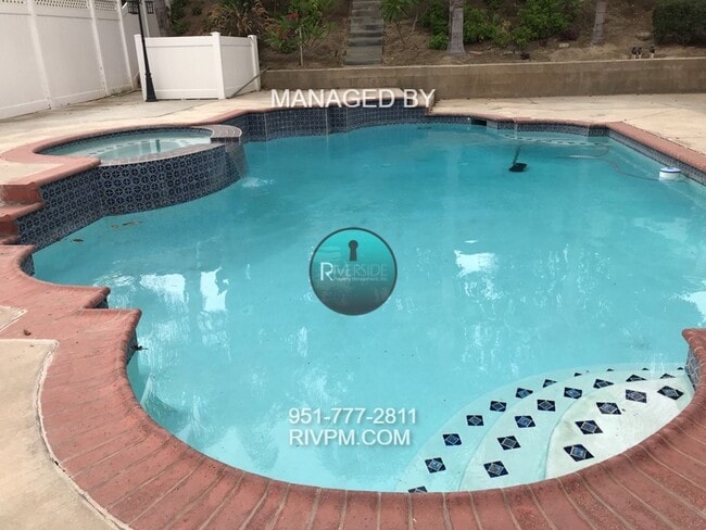 Building Photo - Beautiful 4-Bedroom Home with Pool & Garde...