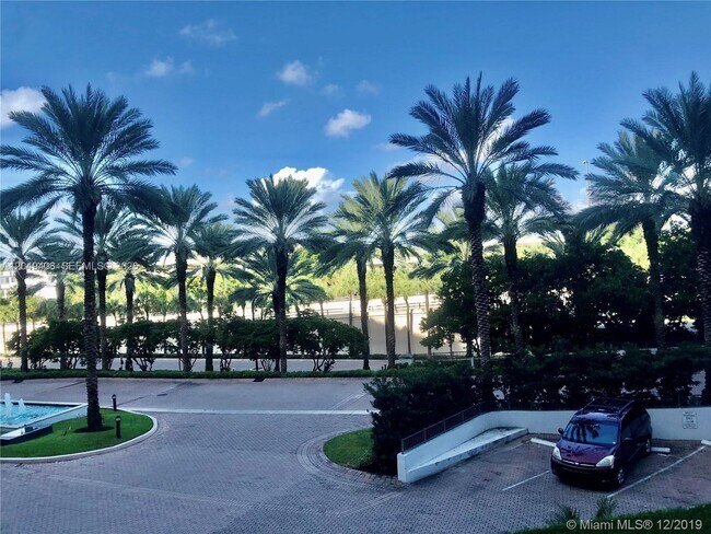 Building Photo - 10275 Collins Ave
