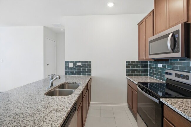 Building Photo - Modern Single-Story Home with Granite Kitchen and Community Pool Access