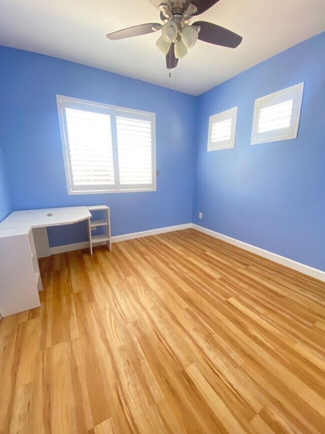 Building Photo - Spacious 5-Bedroom Home with Solar, Stunning Sunroom & Upgraded Bathrooms!