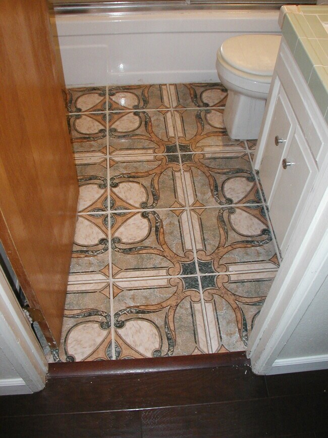 BATHROOM NEW TILE FLOORING - 4220 N First St