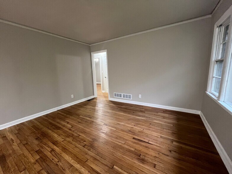 Building Photo - COMING SOON: Classic charm, peaceful living, your Forest Park retreat awaits in this spacious 3-b...