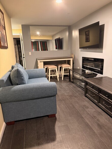 Loveseat and Dining Area - 246 Arcadia Shores Cir