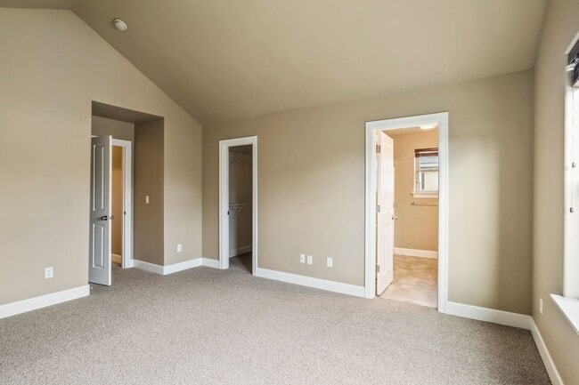 Building Photo - Spacious 4-Bedroom Home with New Paint & Carpet, Fenced Yard