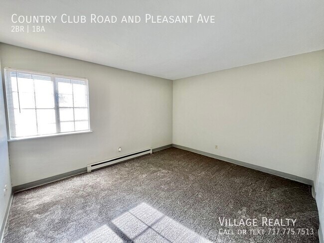 Building Photo - 605 Country Club Rd