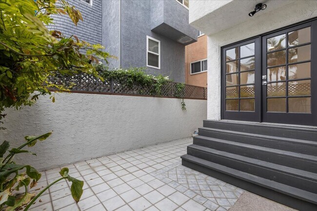 Building Photo - COMPLETELY REMODELED, BRIGHT & AIRY, TRI-LEVEL HOME W/ TOP-FLOOR GREAT ROOM LIVING SPACE, 2-CAR G...