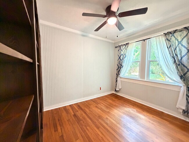 Building Photo - Historic Downtown Charm | Original Floors | Walk to Golf, Dining, Parks, & Concerts