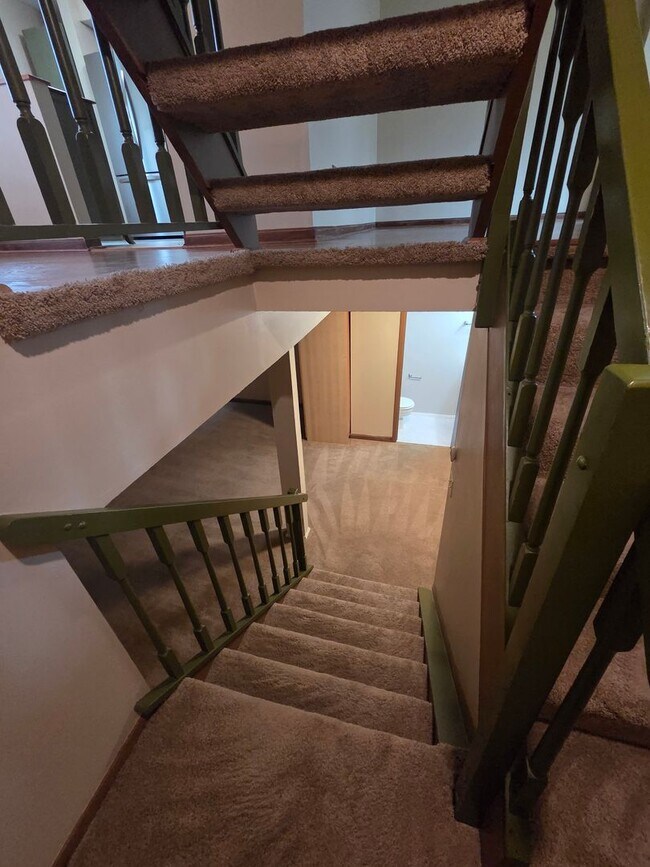 Building Photo - Serene Living in a Quiet Lakeside Community