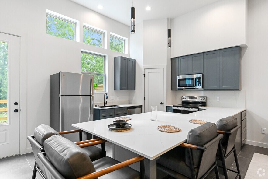 3BR, 2.5BA - 1900SF - Kitchen/Dining Area - Cypress Manor Luxury Living