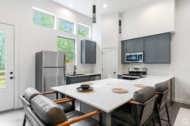 3BR, 2.5BA - 1900SF - Kitchen/Dining Area - Cypress Manor Luxury Living