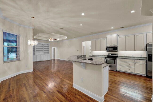Kitchen, Nook and Family Room. - 832 Ashton Oaks Cir
