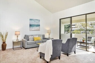 Building Photo - Welcome to this sun-filled spacious top fl...