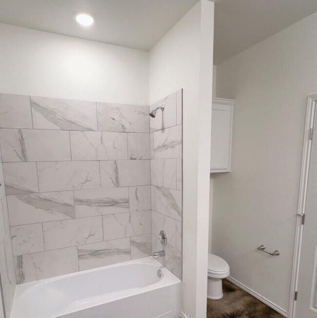 Building Photo - Stunning New 3/2 Townhomes