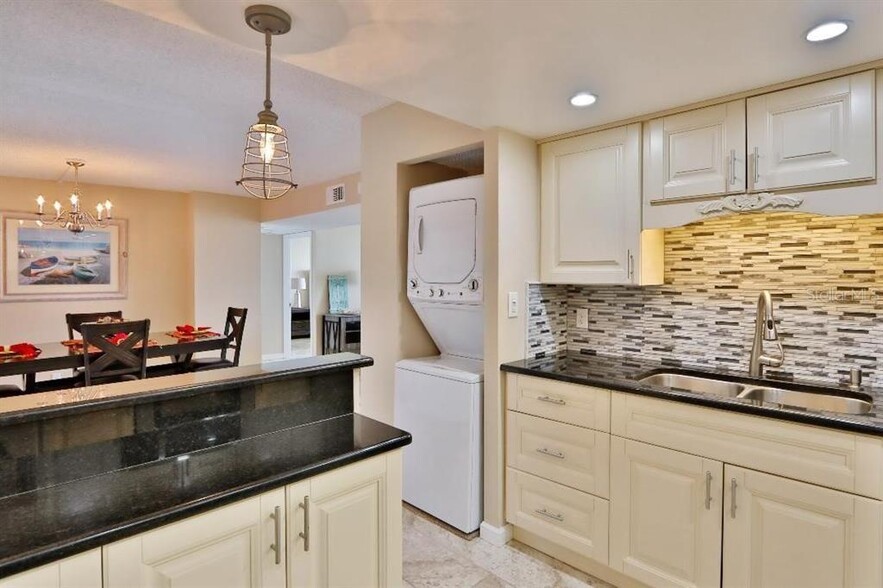 Kitchen open to dining room - 1 Key Capri Key