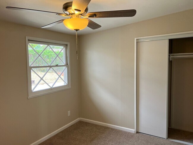 Building Photo - Updated 3BR/2BA home w/yard and garage in ...