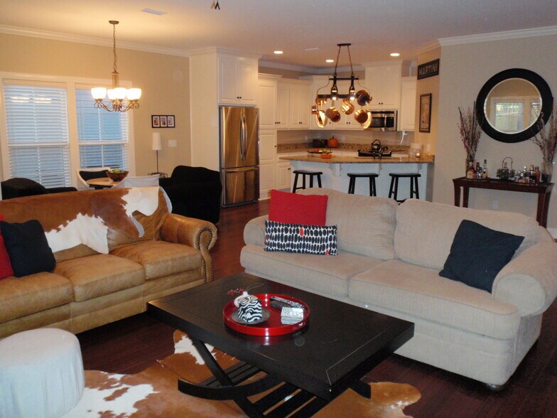open floorplan and well-appointed kichen - 409 Redbud Cir