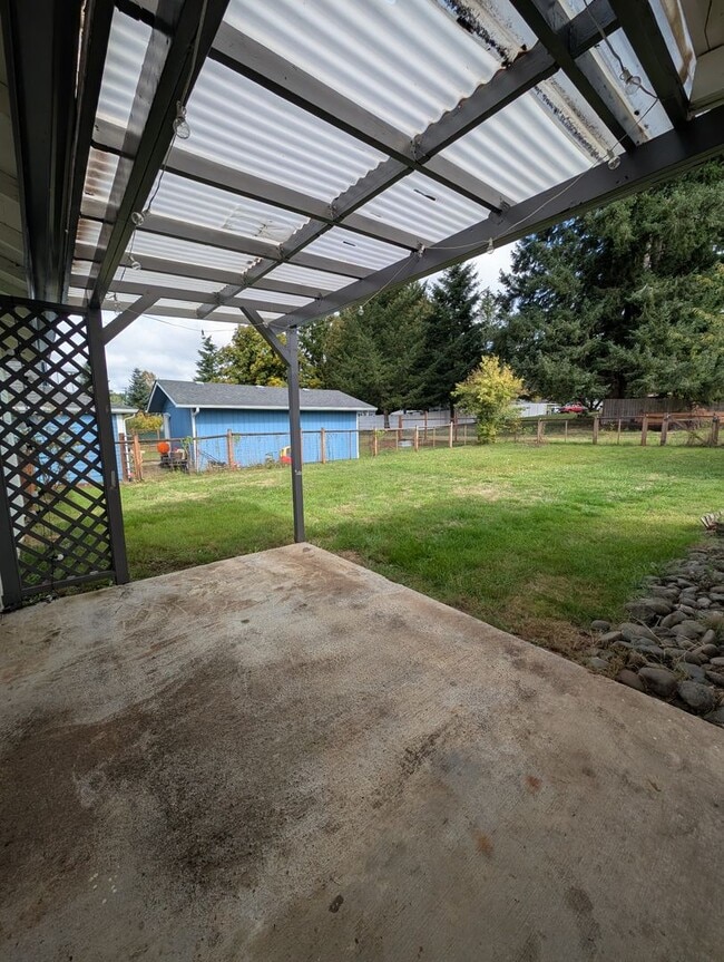 Building Photo - Adorable Four Bedroom w/ Fenced Yard Avail...
