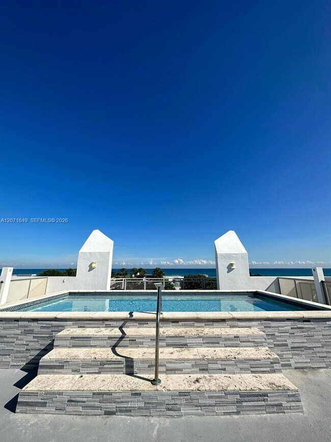 Building Photo - 7728 Collins Ave