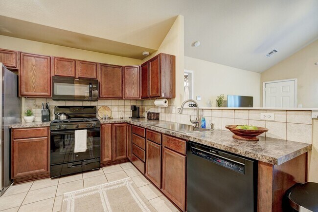 Building Photo - Turnkey Living in Owasso, Stylish Furnished 3-Bed Home with Pond & 2-Car Garage!