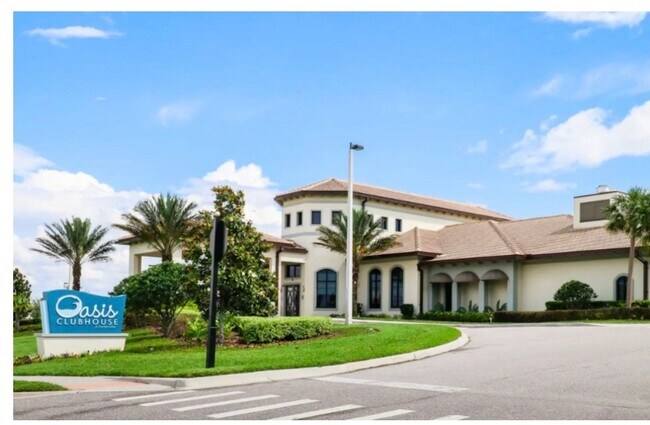 Building Photo - BEAUTIFUL CHAMPIONS GATE 2 BED 2 BATH COND0  w/GARAGE - FULLY FURNISHED - 12 MONTH RENTAL