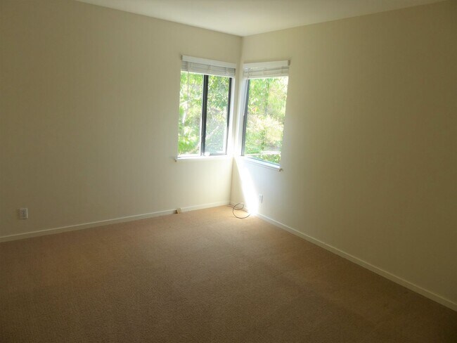 Building Photo - SPACIOUS FOUR BEDROOM / THREE AND HALF BAT...