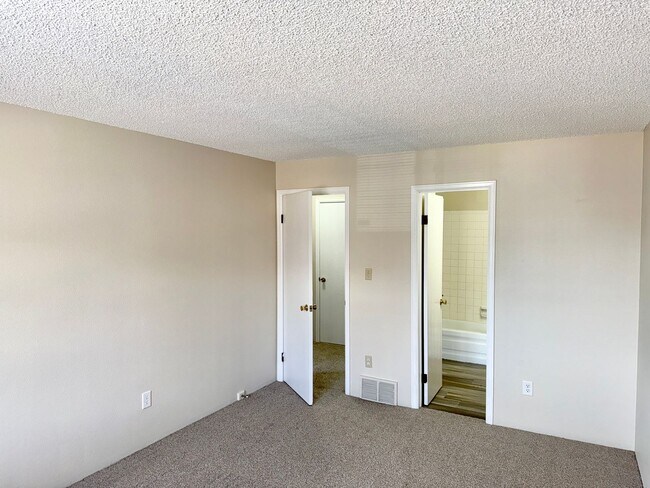 Building Photo - Updated Two Bed Townhome Nestled in the He...