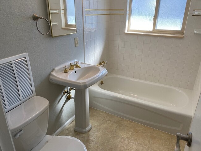 Building Photo - $0 DEPOSIT OPTION. CHARMING BRICK RANCH WI...
