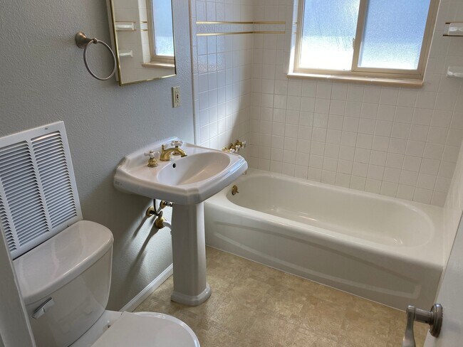 Building Photo - BRICK RANCH, FINISHED BASEMENT, CORNER LOT...