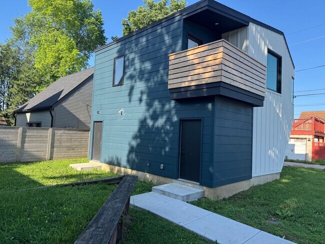 Building Photo - Vaulted Ceilings & Hardwood Floors in This Charming Indianapolis L