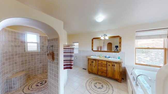 Building Photo - Custom Adobe style home in exclusive Navaj...