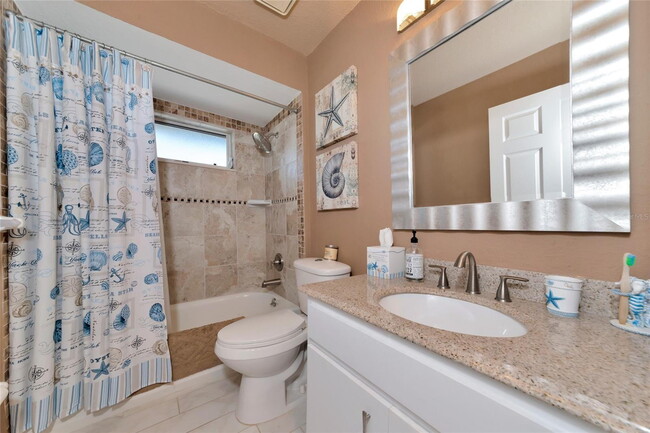 Building Photo - "3-Bedroom Oasis with Granite Accents & Mo...