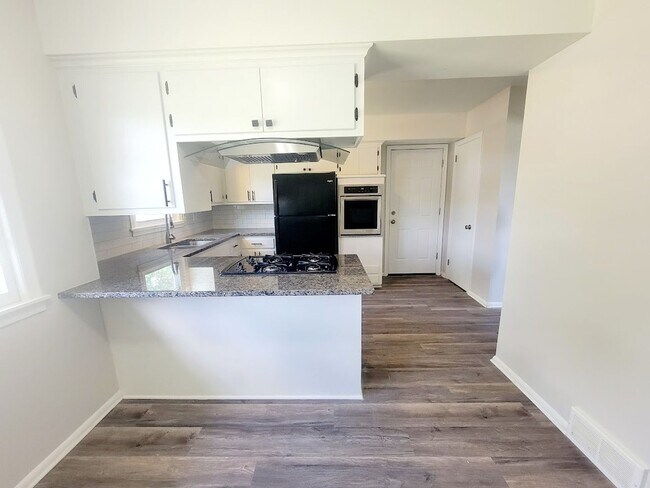 Building Photo - 5641 4th St NE