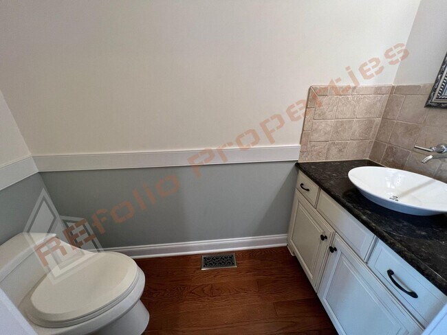 Building Photo - Elegant 3 Story 3 Bedroom Formal Model Tow...