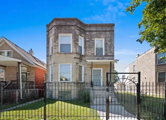 Building Photo - 7144 S Ingleside Ave