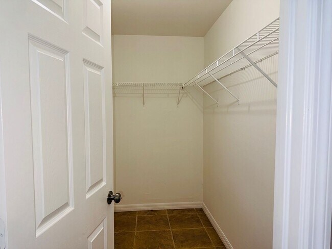 Building Photo - Experience this Cape Coral 3 bedroom 2 bath corner duplex with 1 car garage and screened in lanai.