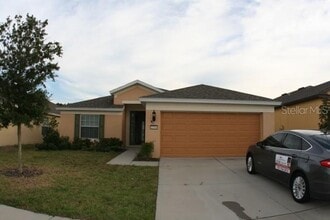 Building Photo - 15566 Sword Lily Pl