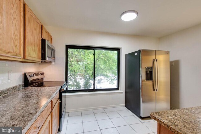 Building Photo - 5461 Enberend Terrace